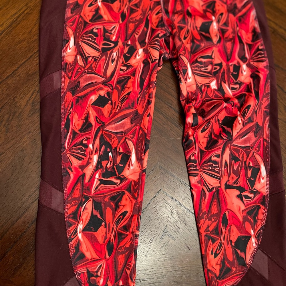 Medium full length athletic leggings with mesh